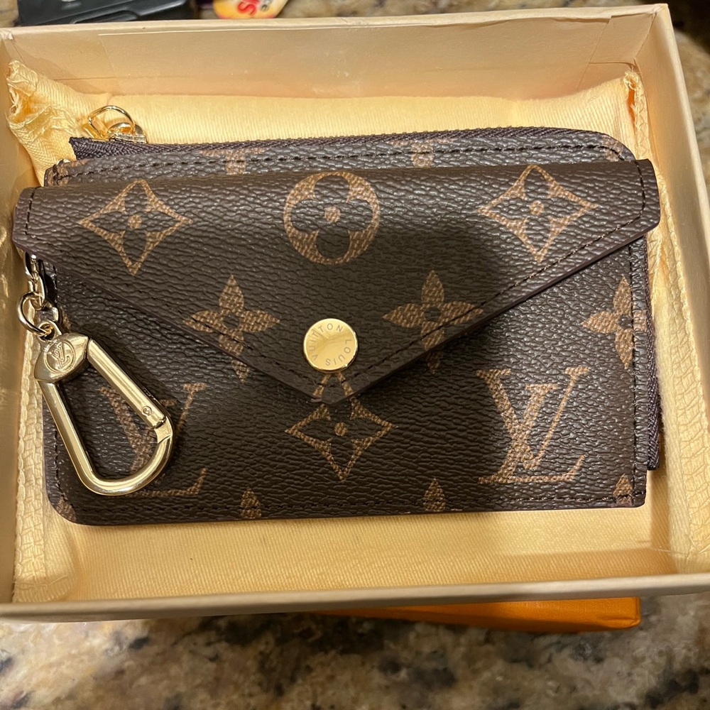 Dupe L V key ring. Brand new.